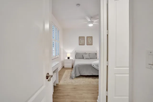 a bedroom with a bed and a couch