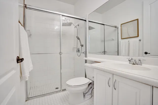 a view of entryway with wooden floor and door