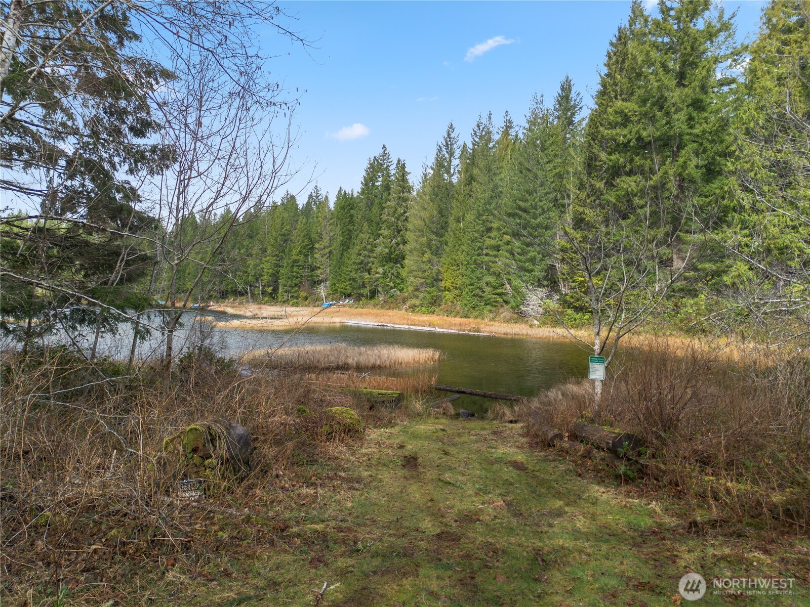 905 Northeast Tahuya Blacksmith Road Tahuya, WA 98588 - Photo 18 of 22 a view of a lake with outdoor space