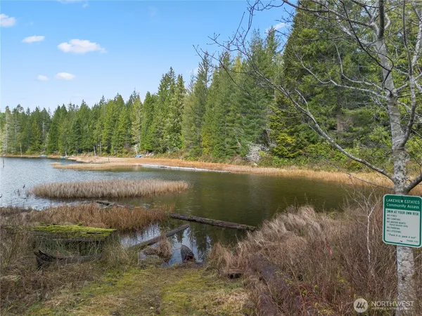 a view of a lake from a yard
