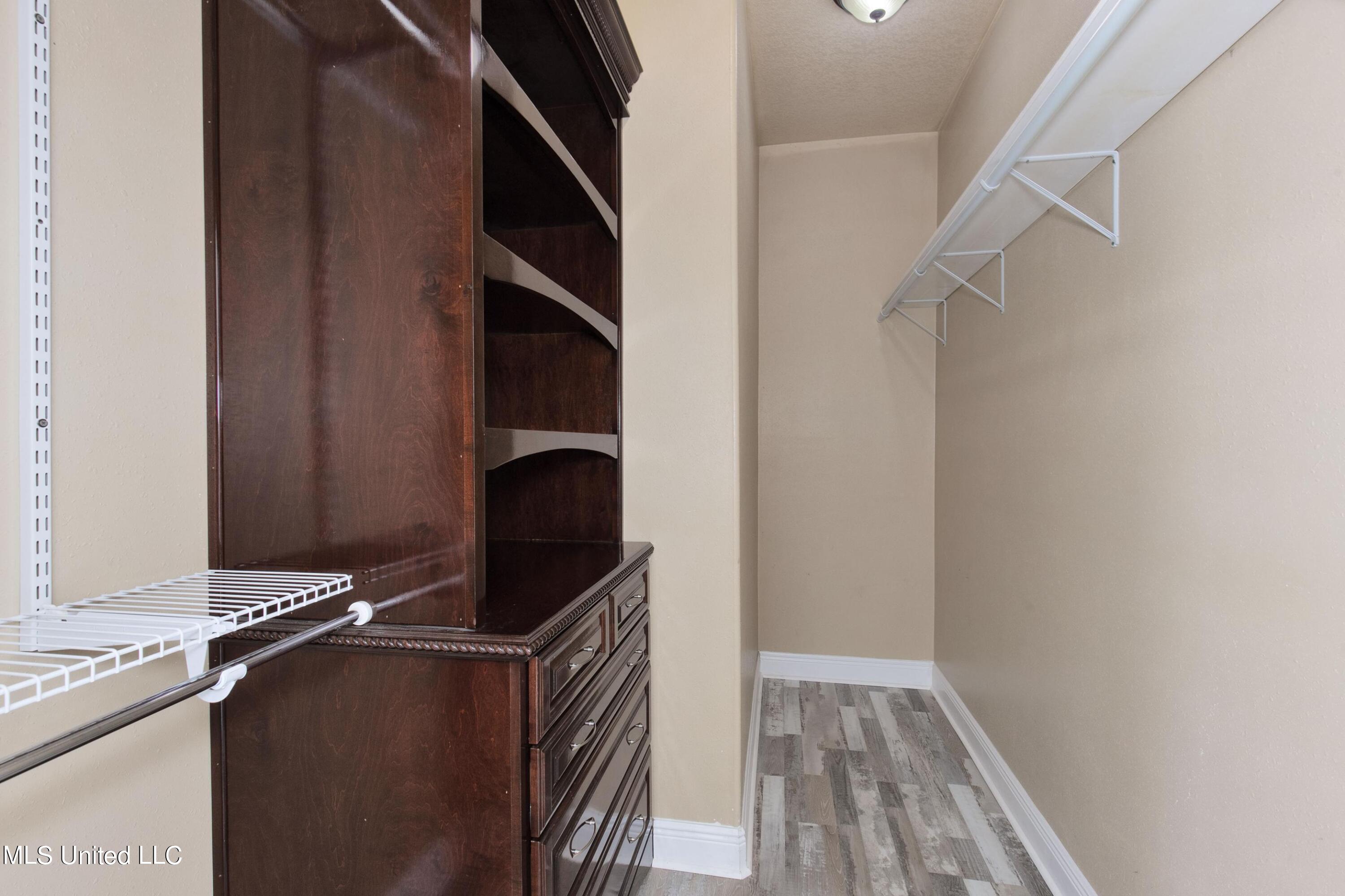 14501 Constitution Road Moss Point, MS 39562 - Photo 19 of 37 Master Closet with Built-ins
