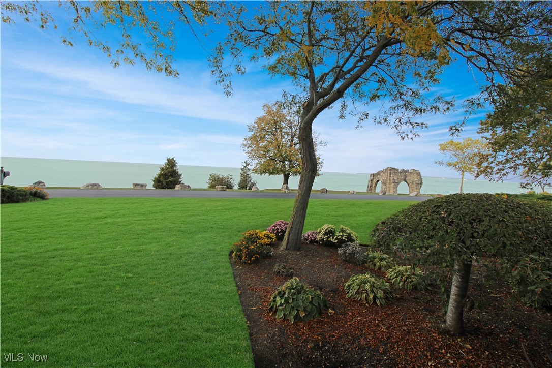 4520 East Cliff Road Port Clinton, OH 43452 - Photo 36 of 50 View of green lawn featuring a water view