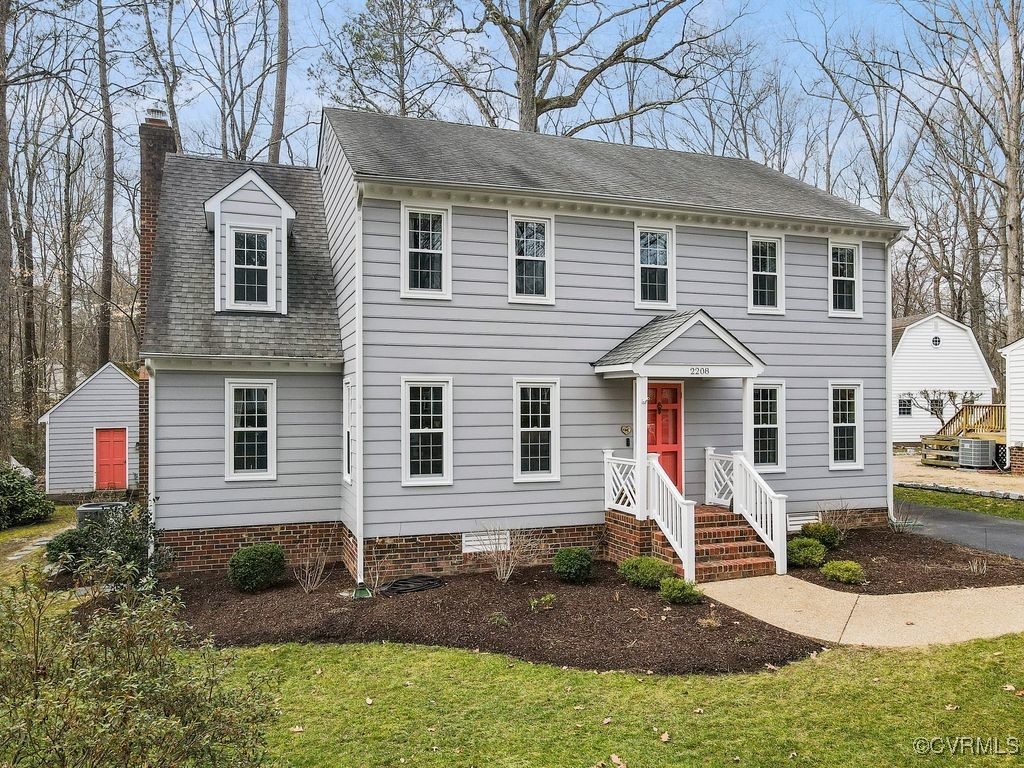 2208 Persimmon Trek Henrico, VA 23233 - Photo 1 of 44 a front view of a house with garden