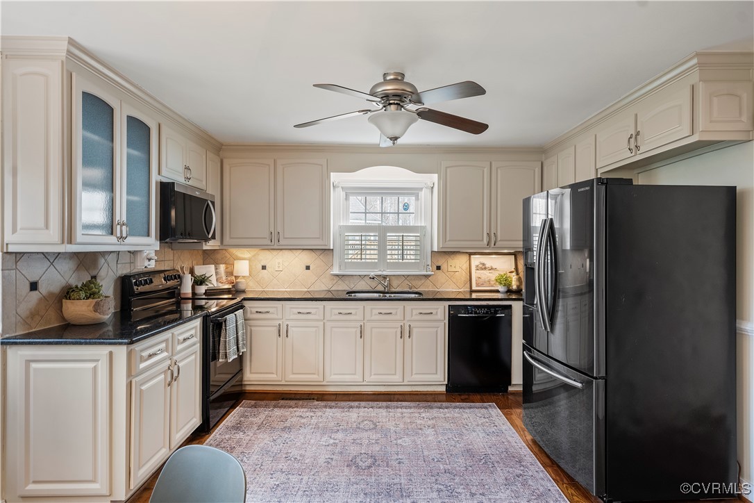 2208 Persimmon Trek Henrico, VA 23233 - Photo 12 of 44 a kitchen with a refrigerator stove and sink