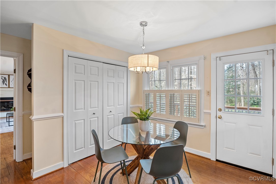 2208 Persimmon Trek Henrico, VA 23233 - Photo 16 of 44 a view of a dining room with furniture window and wooden floor