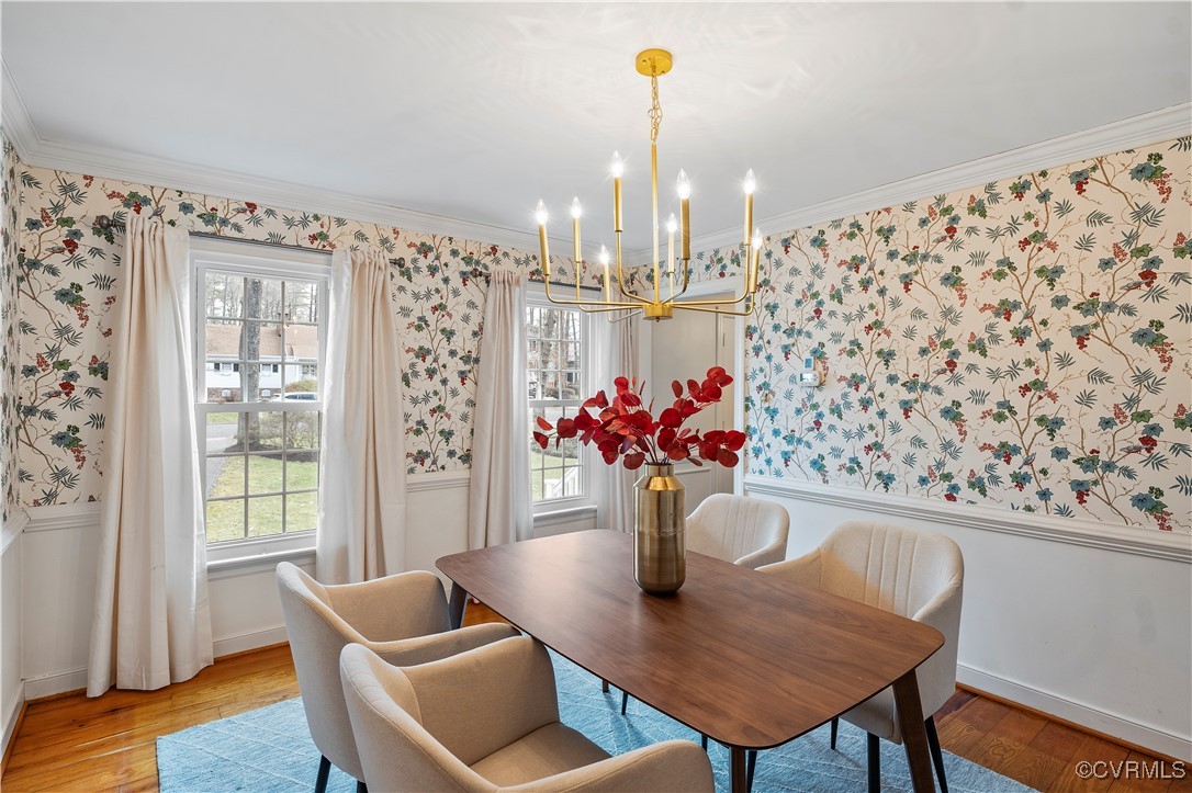 2208 Persimmon Trek Henrico, VA 23233 - Photo 17 of 44 a view of a dining room with furniture and chandelier