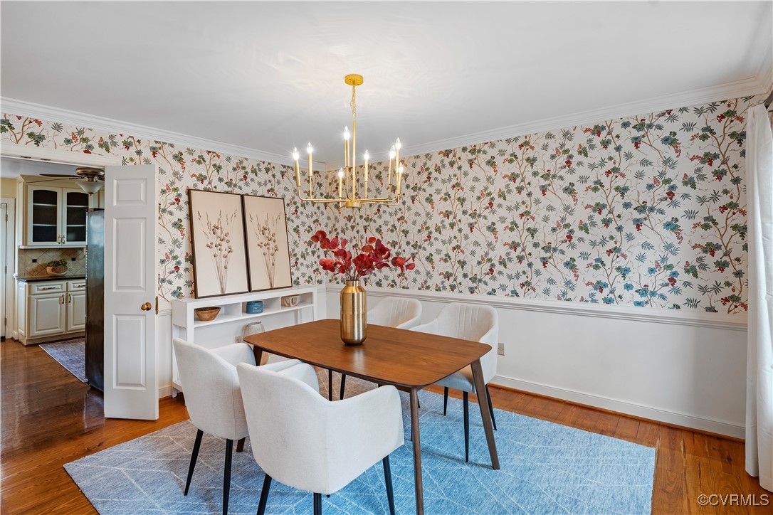 2208 Persimmon Trek Henrico, VA 23233 - Photo 18 of 44 a view of a dining room with furniture and wooden floor