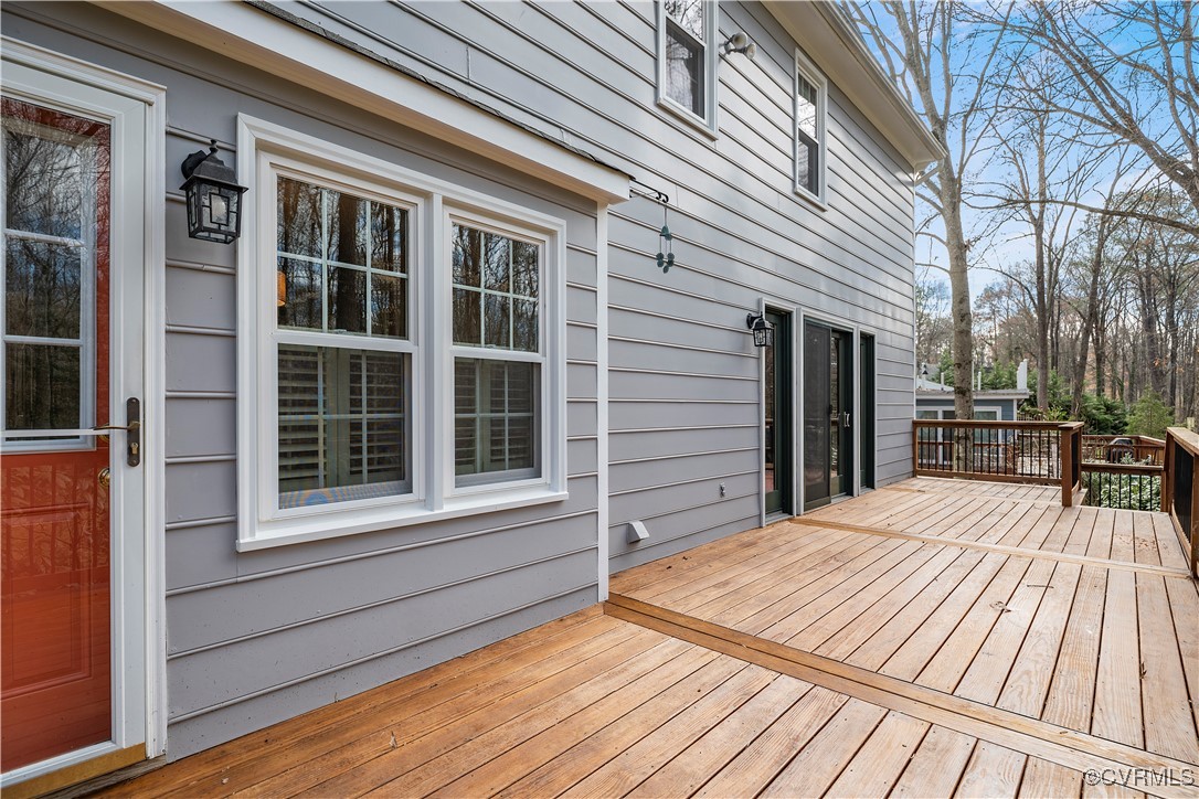 2208 Persimmon Trek Henrico, VA 23233 - Photo 30 of 44 a view of a house with a barbeque and wooden floor