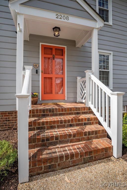 2208 Persimmon Trek Henrico, VA 23233 - Photo 3 of 44 a front view of a house with a porch
