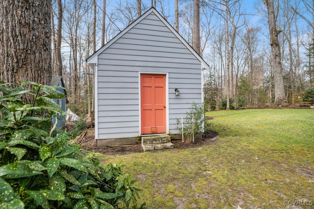 2208 Persimmon Trek Henrico, VA 23233 - Photo 36 of 44 a view of a backyard with a garden