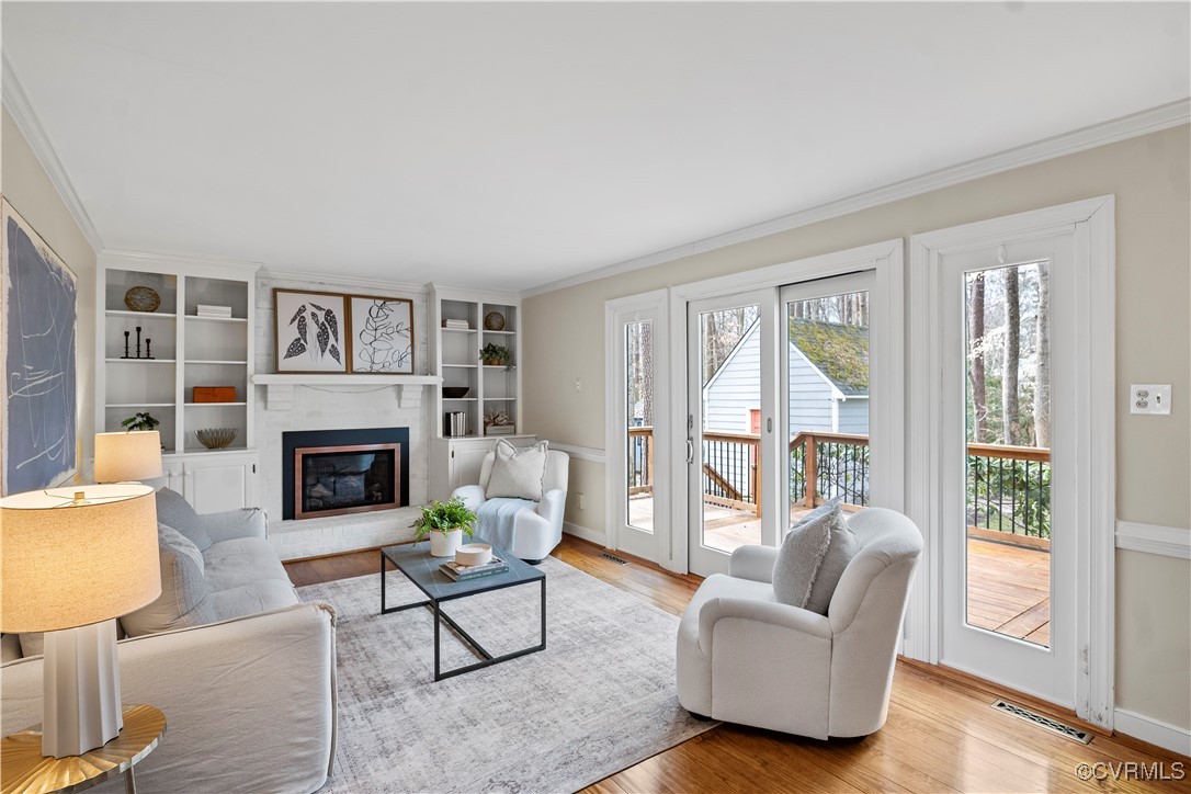 2208 Persimmon Trek Henrico, VA 23233 - Photo 8 of 44 a living room with furniture and a fireplace