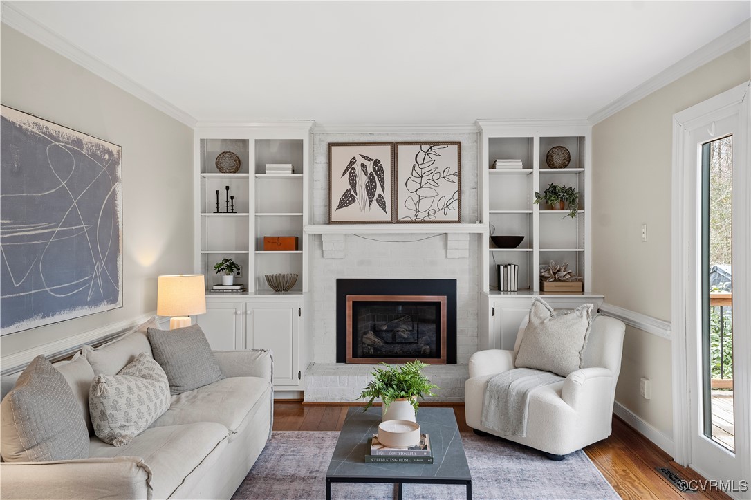 2208 Persimmon Trek Henrico, VA 23233 - Photo 9 of 44 a living room with furniture and a fireplace