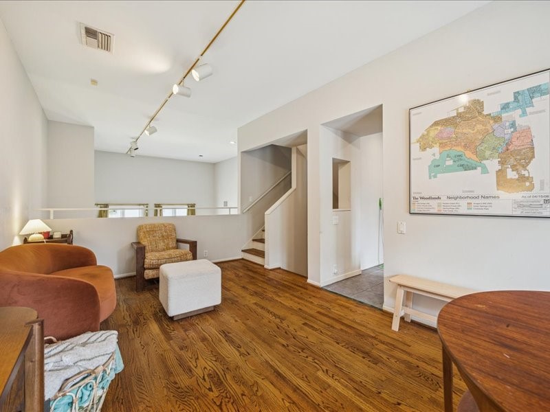 1369 Arlington Street, Unit 1369 Houston, TX 77008 - Photo 11 of 35 a living room with furniture and wooden floor