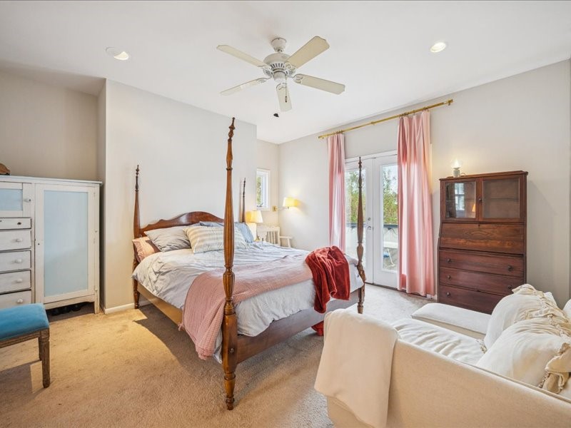 1369 Arlington Street, Unit 1369 Houston, TX 77008 - Photo 23 of 35 a bedroom with a bed couch and window