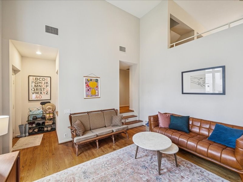 1369 Arlington Street, Unit 1369 Houston, TX 77008 - Photo 10 of 35 a living room with furniture and a rug