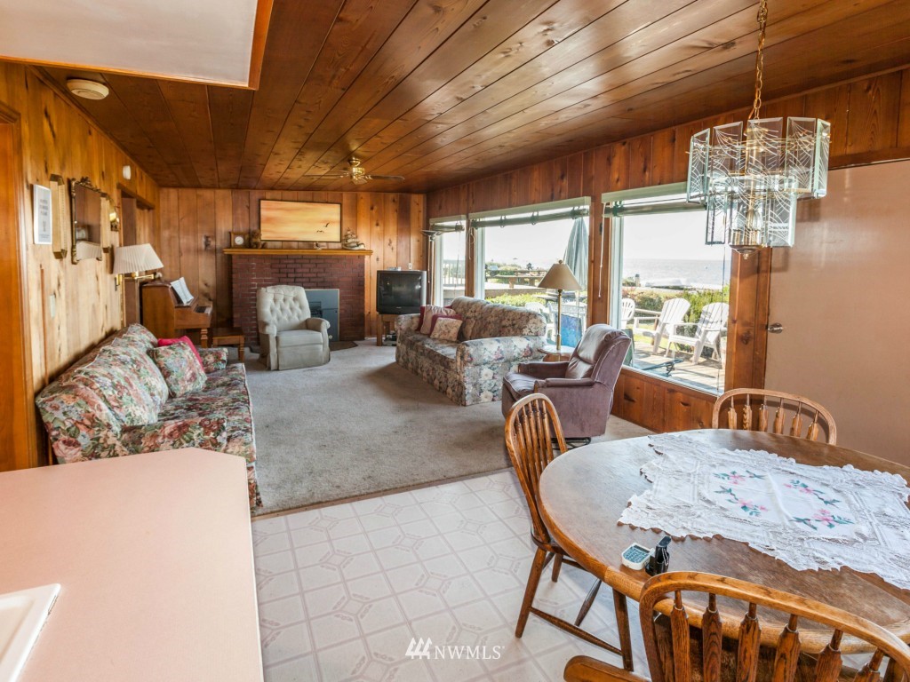 6378 South Bay Road Freeland, WA 98249 - Photo 11 of 25 a view of a dining room with furniture window and outside view