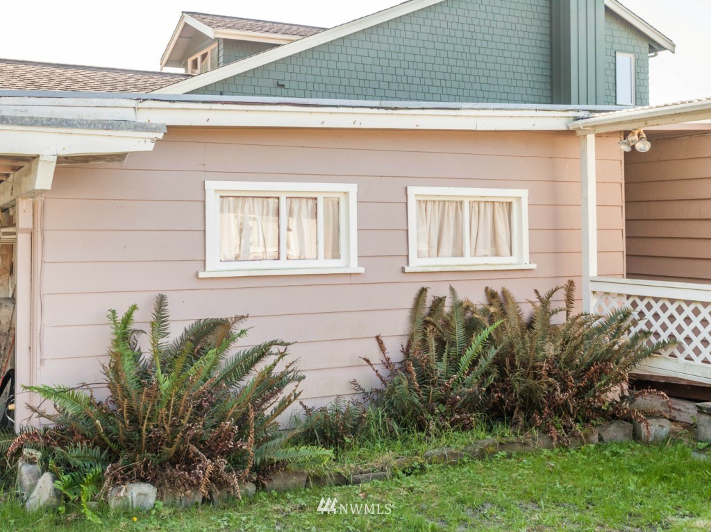 6378 South Bay Road Freeland, WA 98249 - Photo 16 of 25 a view of a house with a window and garden