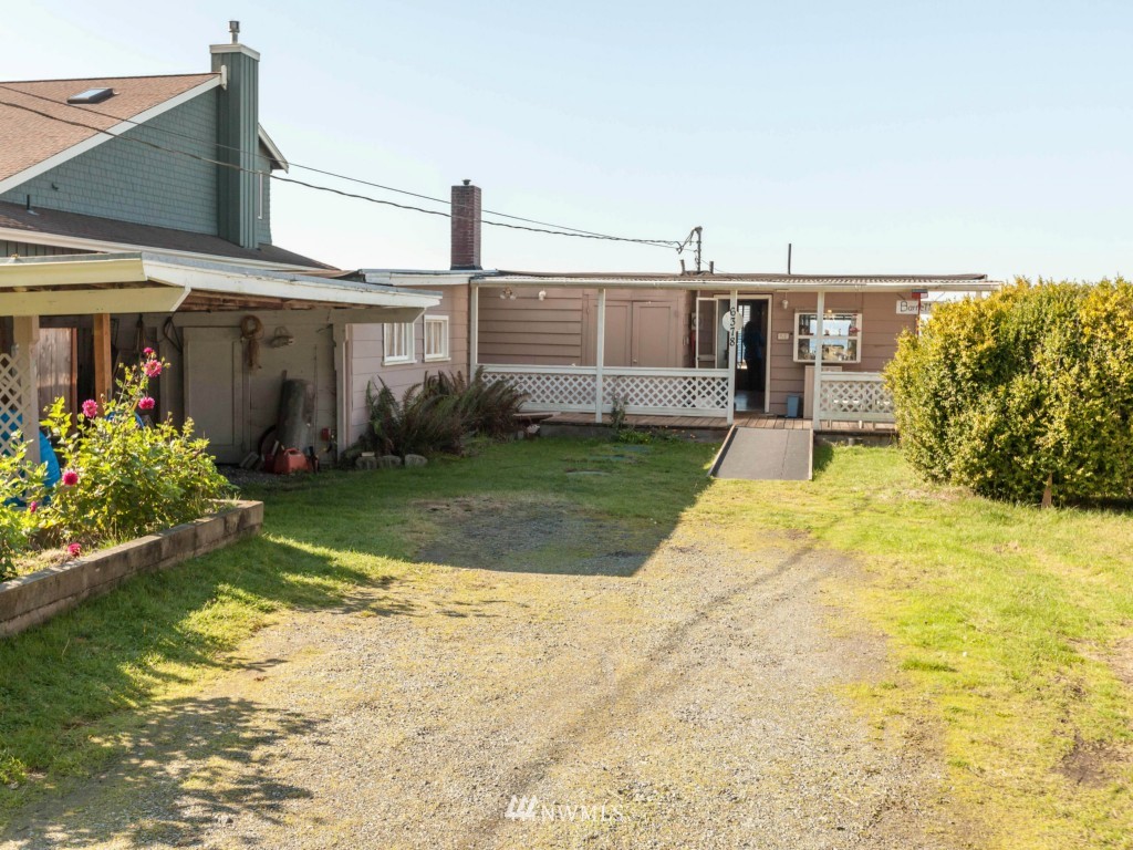 6378 South Bay Road Freeland, WA 98249 - Photo 17 of 25 a view of a house with a patio