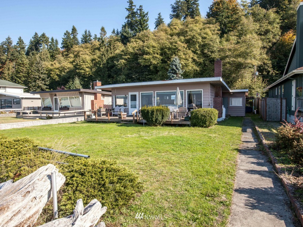 6378 South Bay Road Freeland, WA 98249 - Photo 22 of 25 a house view with swimming pool and garden space