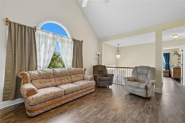 a living room with furniture and a couch