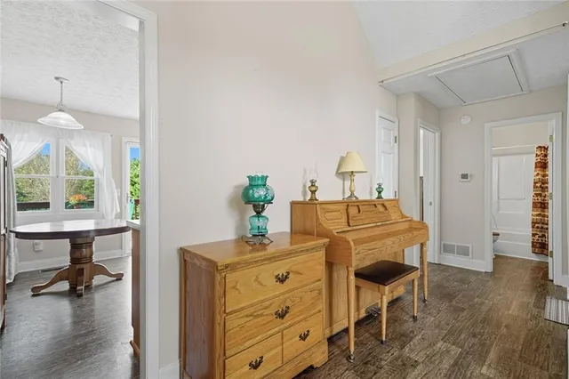 a workspace with furniture and wooden floor