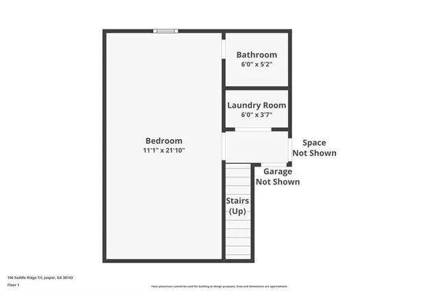 a picture of a bench in front of a wall