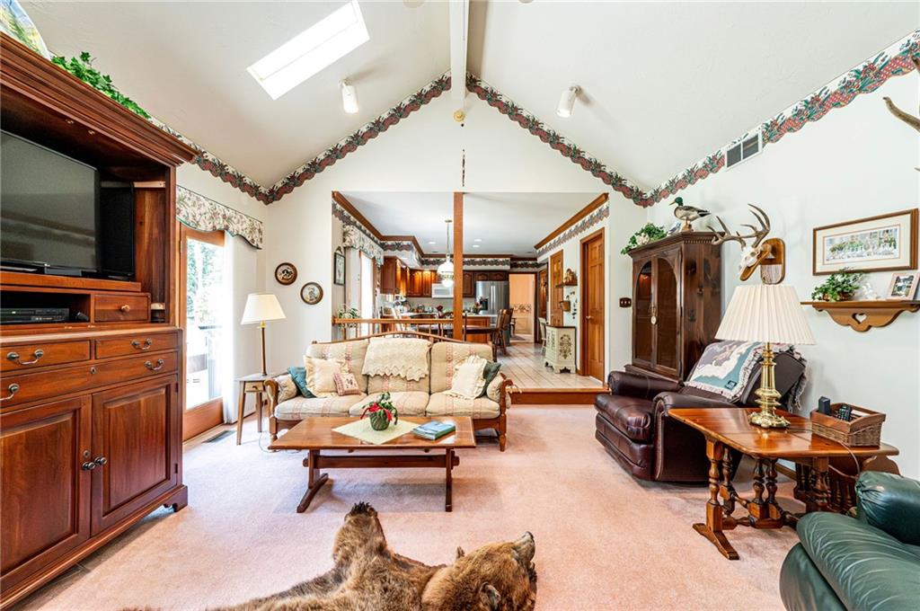 1118 Sandstone Road Greensburg, PA 15601 - Photo 18 of 50 a living room with furniture and a flat screen tv