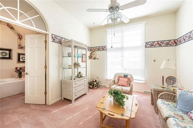 a view of a swimming pool with a lounge chairs