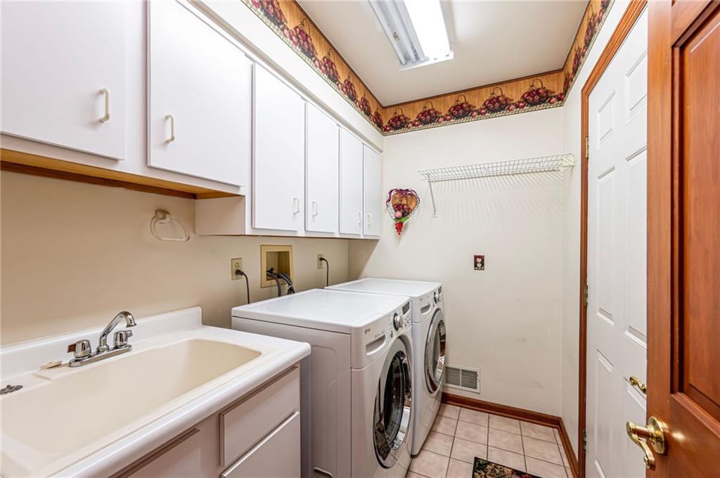 1118 Sandstone Road Greensburg, PA 15601 - Photo 37 of 50 a utility room with dryer and washer