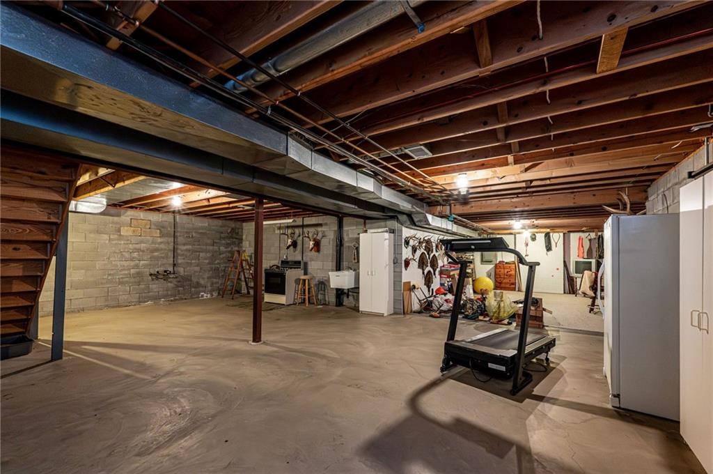 1118 Sandstone Road Greensburg, PA 15601 - Photo 39 of 50 a view of a room with gym equipment