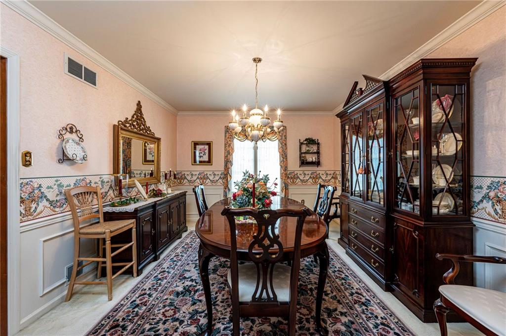 1118 Sandstone Road Greensburg, PA 15601 - Photo 6 of 50 a view of a dining room with furniture and chandelier