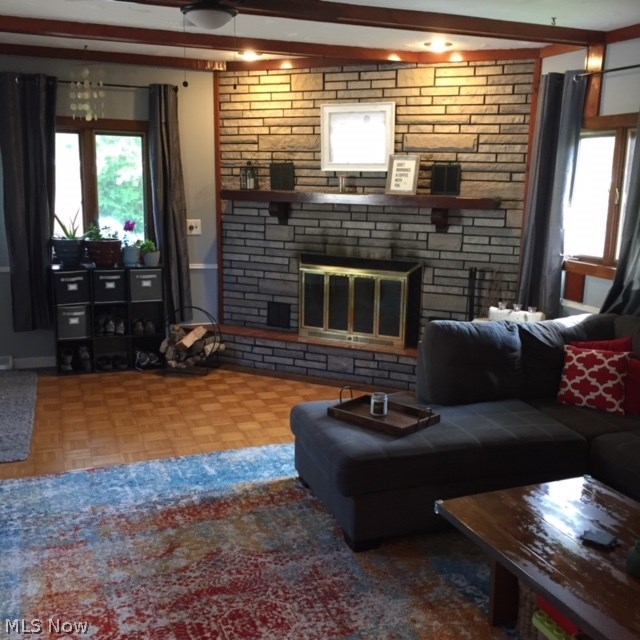 11925 Reno Drive Parma, OH 44130 - Photo 10 of 32 Gorgeous Parquet Floors in Family Room with Woodburning Fireplace and Beamed Ceilings!