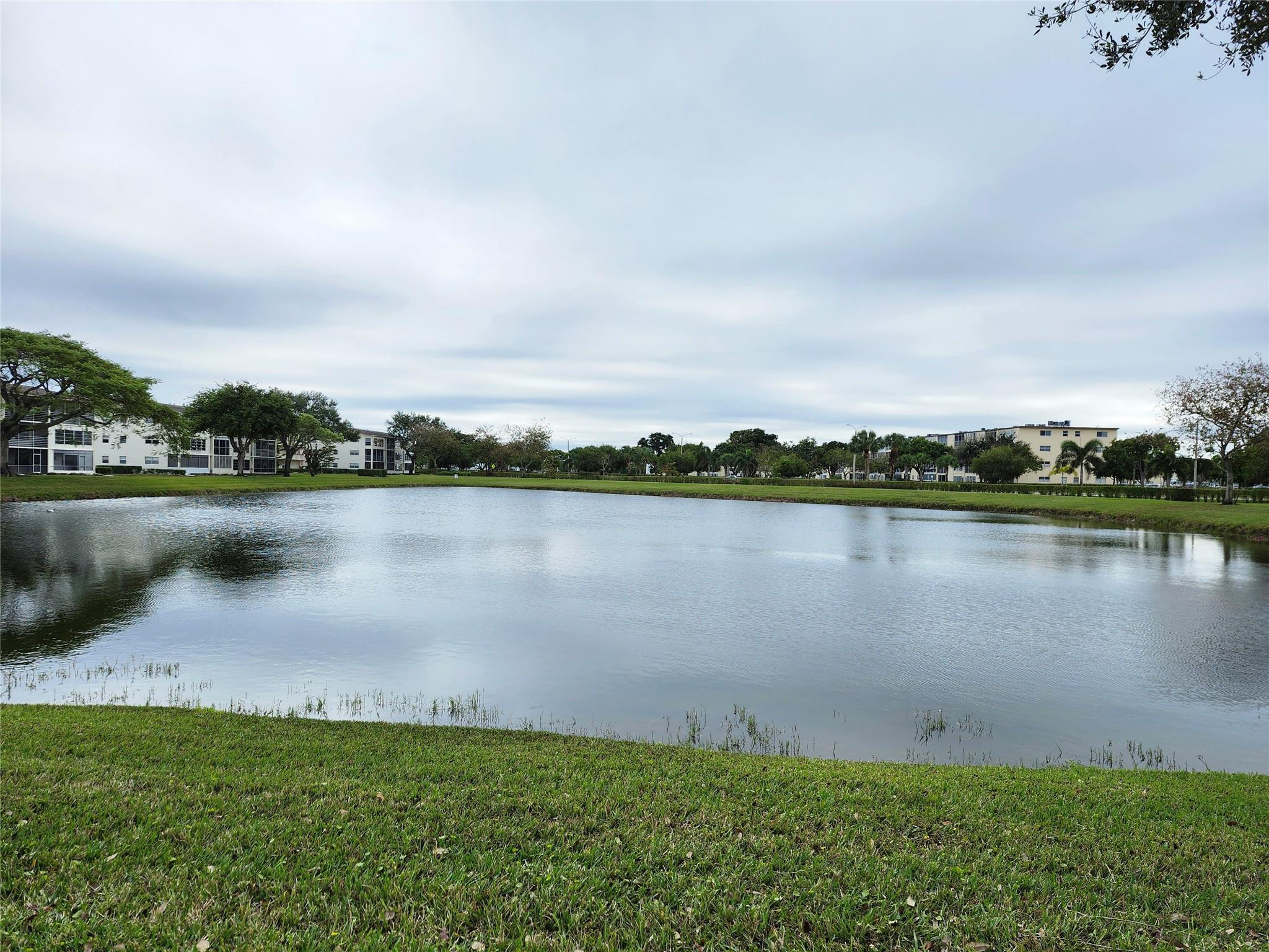 74 Preston Way Boca Raton, FL 33434 - Photo 2 of 28 a view of a lake