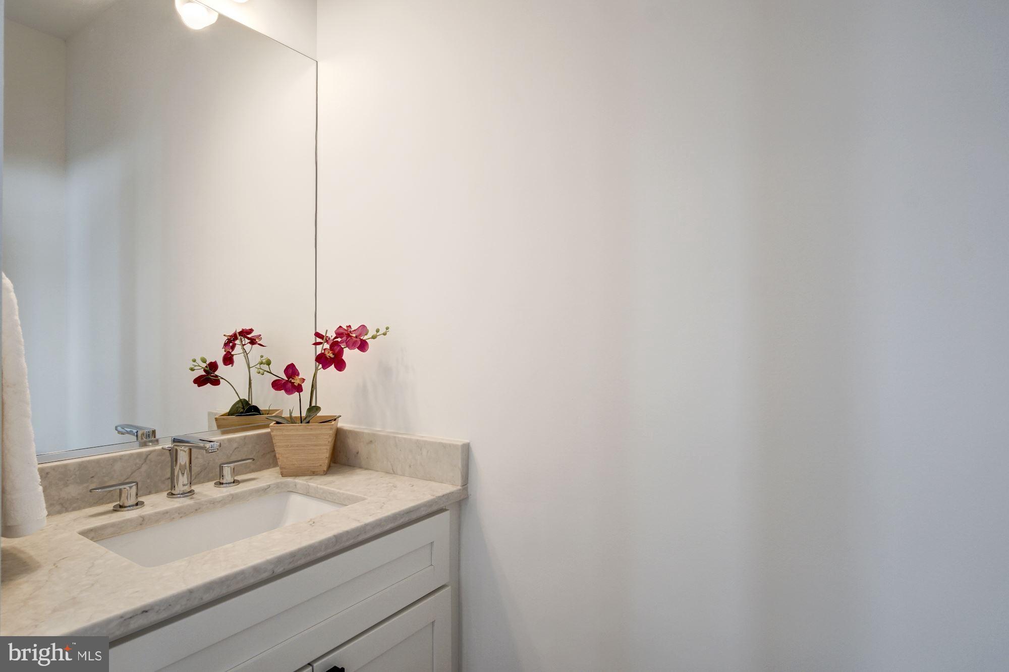 609 Gresham Place Northwest, Unit 2 Washington, DC 20001 - Photo 5 of 20 1/2 bath for guests on main level