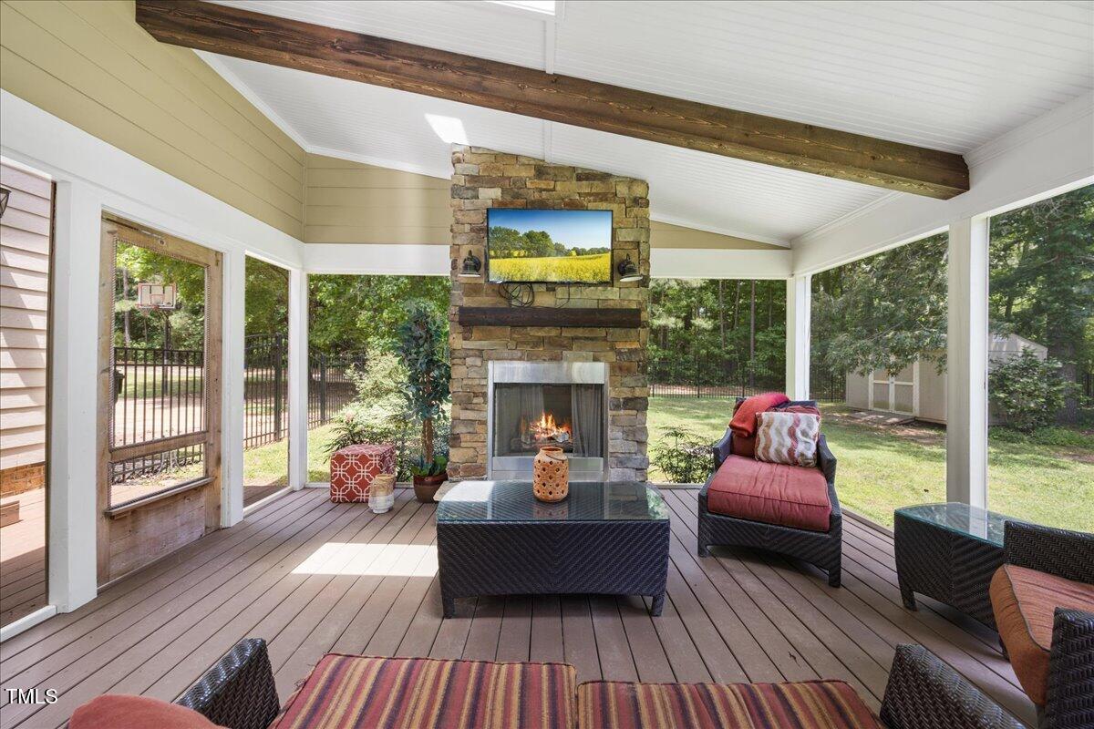 12636 Old Creedmoor Road Raleigh, NC 27613 - Photo 34 of 45 Stone Fireplace in Porch Area