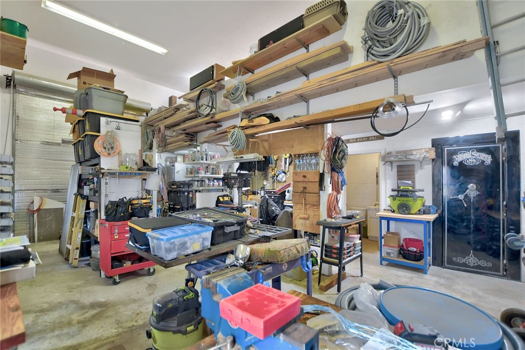 18032 Ohna Road Apple Valley, CA 92307 - Photo 50 of 65 a living room with lots of furniture and a chandelier
