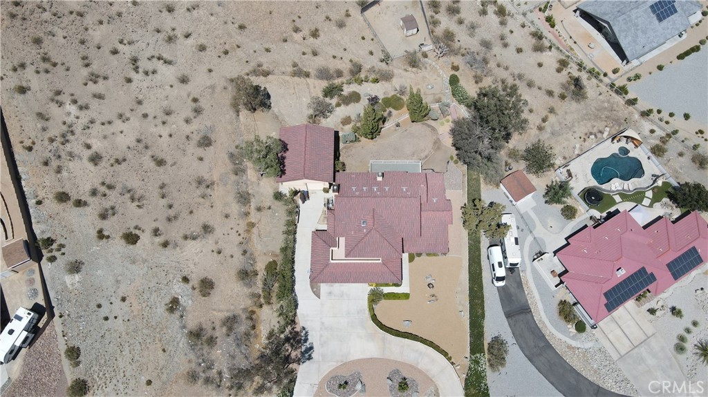 18032 Ohna Road Apple Valley, CA 92307 - Photo 61 of 65 an aerial view of a house with a yard