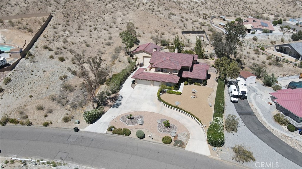 18032 Ohna Road Apple Valley, CA 92307 - Photo 62 of 65 an aerial view of a house with a garden