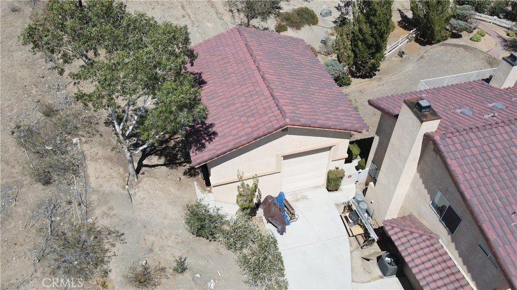 18032 Ohna Road Apple Valley, CA 92307 - Photo 63 of 65 an aerial view of a house with a yard
