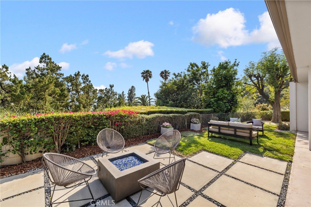 598 Camillo Road Sierra Madre, CA 91024 - Photo 63 of 75 a view of a chairs and table in backyard