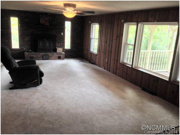 1189 John Foster Road Columbus, NC 28722 - Photo 4 of 12 a living room with furniture and large windows