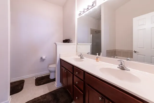 a bathroom with a sink and a toilet