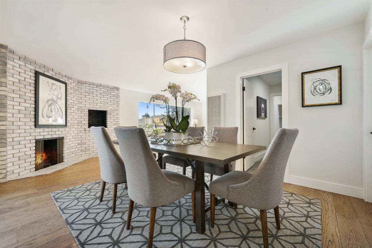 2135 Queens Lane San Mateo, CA 94402 - Photo 16 of 50 a view of a dining room with furniture window and wooden floor