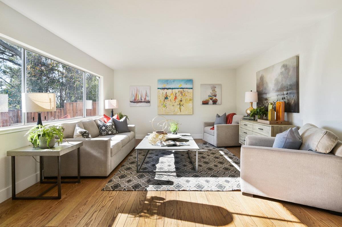 2135 Queens Lane San Mateo, CA 94402 - Photo 19 of 50 a living room with furniture and a large window