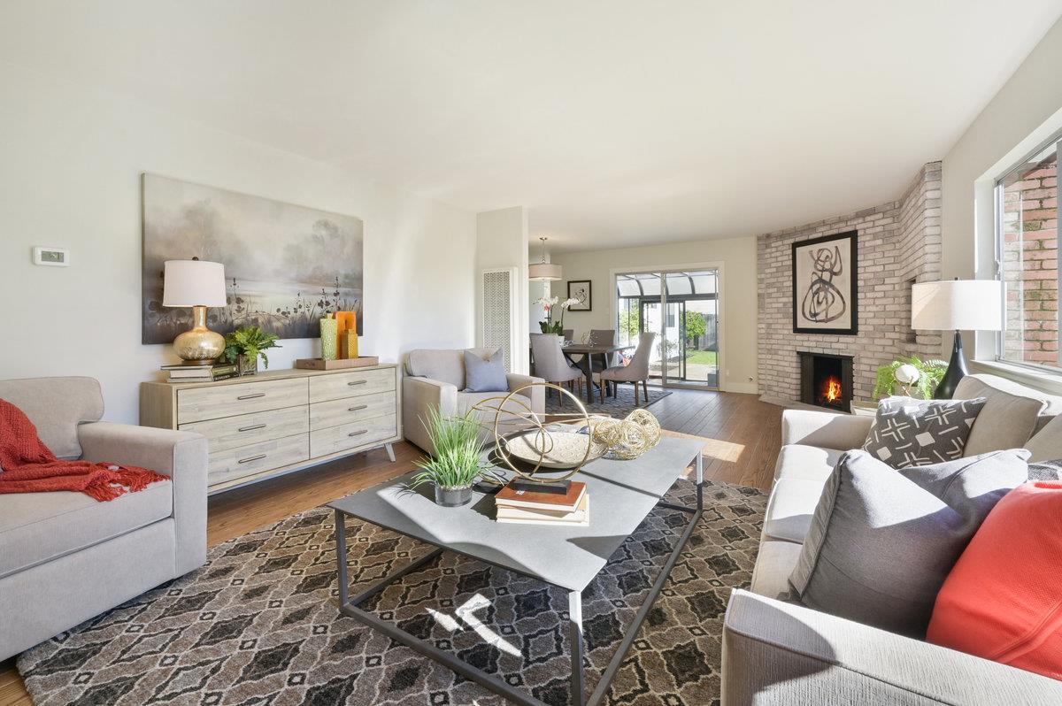 2135 Queens Lane San Mateo, CA 94402 - Photo 21 of 50 a living room with furniture and wooden floor