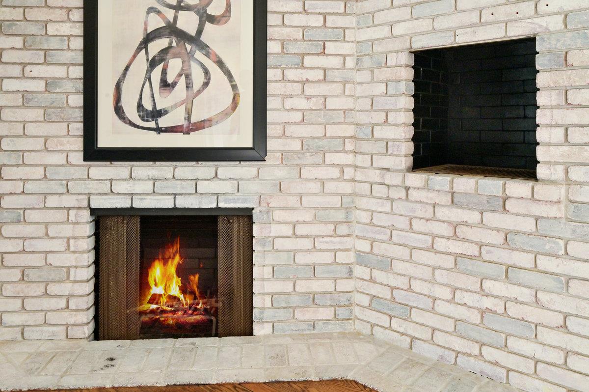 2135 Queens Lane San Mateo, CA 94402 - Photo 22 of 50 a view of a fireplace with a wooden bench