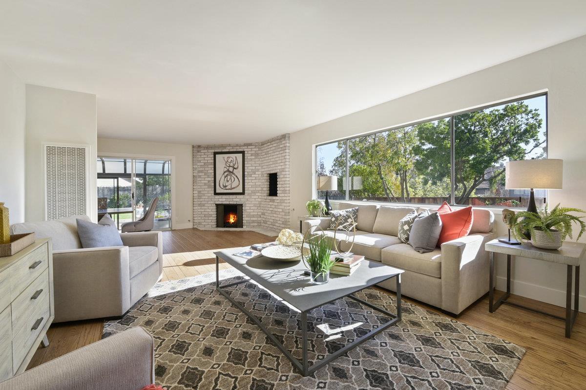 2135 Queens Lane San Mateo, CA 94402 - Photo 23 of 50 a living room with furniture potted plant and a large window