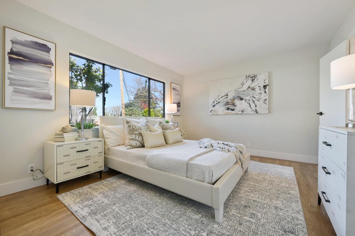 2135 Queens Lane San Mateo, CA 94402 - Photo 24 of 50 a bedroom with a bed and a window