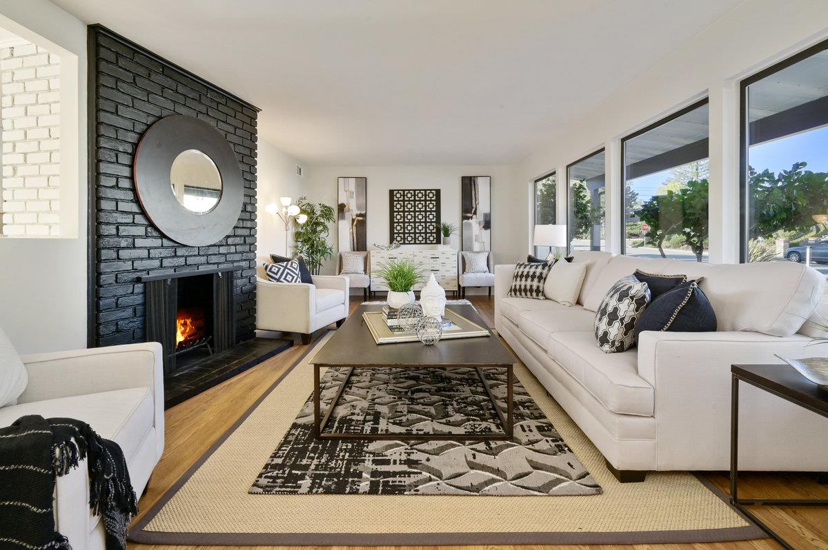 2135 Queens Lane San Mateo, CA 94402 - Photo 3 of 50 a living room with furniture and a fireplace