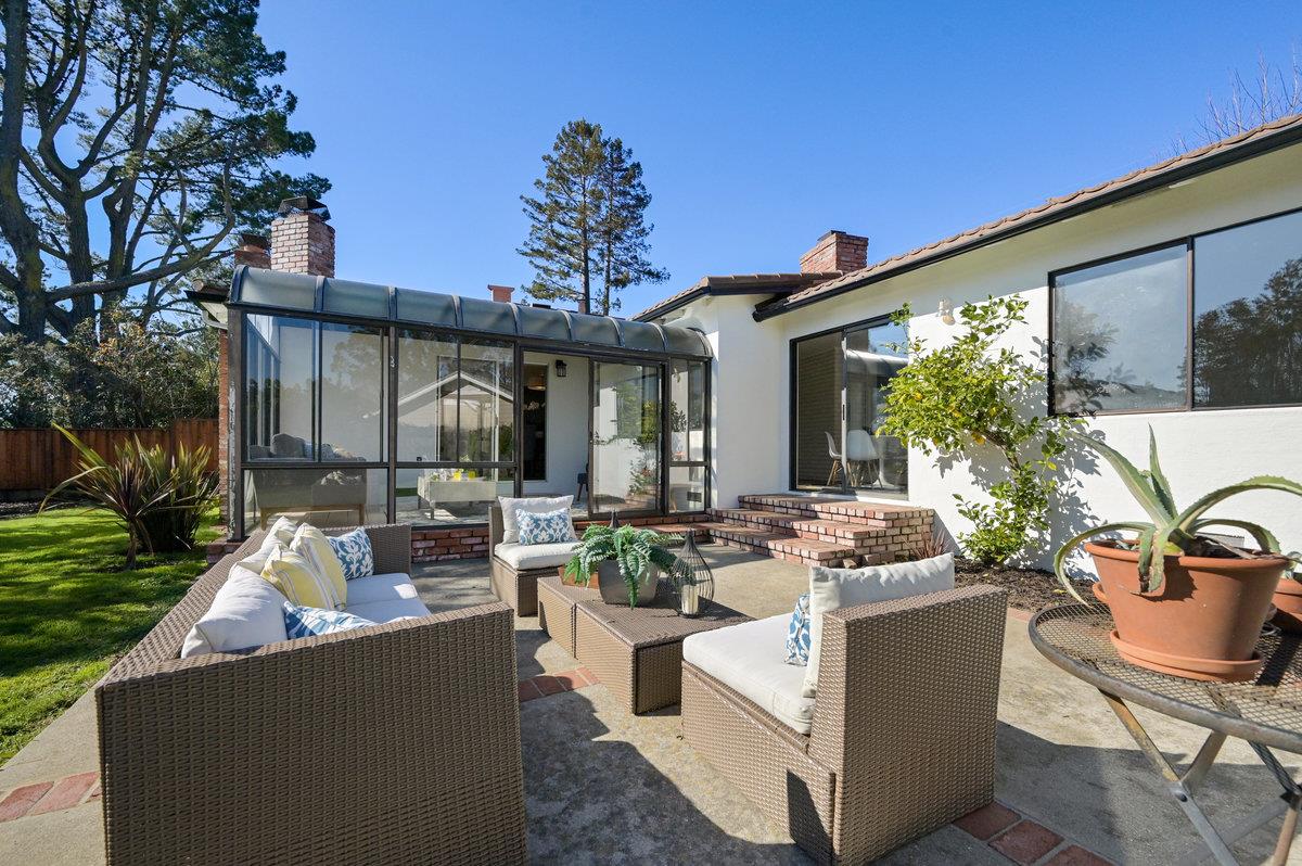 2135 Queens Lane San Mateo, CA 94402 - Photo 38 of 50 a view of a patio with couches table and chairs and potted plants
